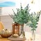 32 piece set of artificial eucalyptus stems with mixed greenery, featuring silver dollar style leaves, designed for rustic vases, floral arrangements, wreaths, bouquets, and wedding decorations in a classic style